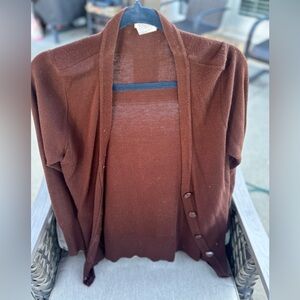 Button, brown cardigan